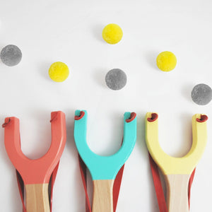 Catapult handmade from natural wood and rubber - yellow, coral, mint colours - jiminy eco-toys