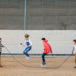 Load image into Gallery viewer, Playground jump rope, 100% plastic-free (beechwood and cotton) - 4.5 metres long = up to 3 people jump at once! - jiminy eco-toys